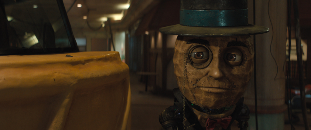 The Electric State. Mr. Peanut (voiced by Woody Harrelson) in The Electric State. Cr. /© 2025 Netflix. Used with permission